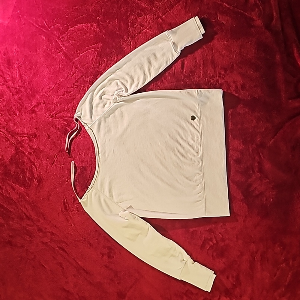 Woman's Juicy Couture, long sleeve sweatshirt size Large in white